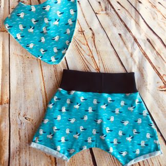 Harems Shorts & Bib Set (6-12 months) in Blue jersey fabric with seagulls design, with black ribbing & rolled hems